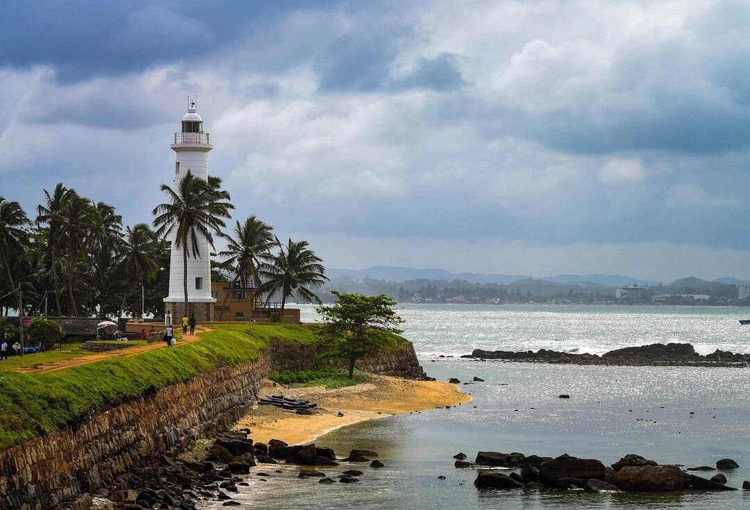Galle, Galle is located on the southern coast of Sri Lanka, about 120 km south of Colombo. It sits on a peninsula and is surrounded by the Indian Ocean.